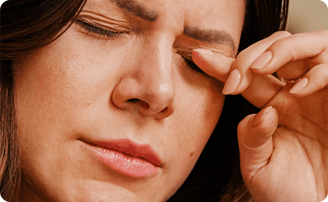 Person experiencing dry eye symptoms